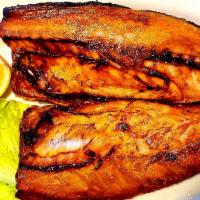 25. Go Deung Uh Gui 고등어 구이 · Fried salted mackerel fish.