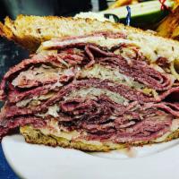 Combo Reuben Sandwich · Served with corned beef and pastrami.
