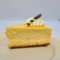 Plain Cheesecake · Per slice. Rich creamy cake.