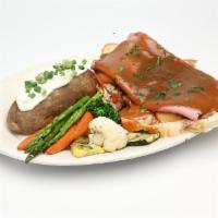Hot Open Roast Beef Dinner · 8 oz. fresh meat, served on white bread, topped with brown gravy.

Comes with Mashed or Bake...