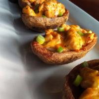 Buffalo Chicken Potato Skins · Potato skins filled with, grilled buffalo chicken, cheddar jack cheese, scallions, and ranch...