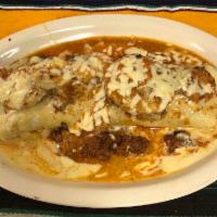 Barzon Burrito · Flour tortilla filled with grilled chicken, steak, onions, and beans. Topped with chorizo, s...