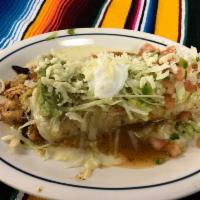 Hot & Spicy Burrito · Flour tortilla filled with chicken, steak, rice, and beans. Covered with cheese and ranchers...