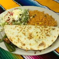 Quesadilla Mexicana · Stuffed with cheese, chicken, chorizo, and jalapenos. Served with rice, beans, and salad. 