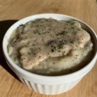 Side Mashed Potatoes and Gravy · Gluten-free. A side of our rosemary mashed potatoes topped with creamy sage gravy.