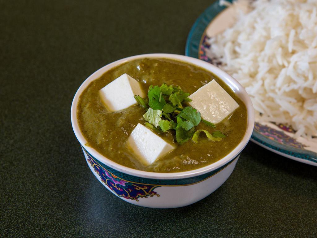 Saag Paneer · Cottage cheese cubes simmered in creamy gravy of spinach, mustard leaves and other greens.
