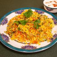 Chicken Biryani · Aromatic spicy basmati rice dish prepared by cooking rice with chicken and assortment of spi...