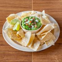 Chunky Guacamole and Chips · A creamy dip made from avocado.