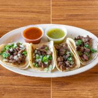 4 Street Tacos · Choice of tortilla. Carne asada, topped with onion and cilantro. Add extras for an additiona...