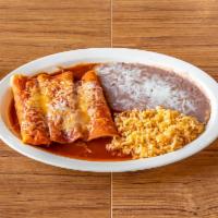 3 Original Enchiladas Plate · Flour or corn tortillas, chicken or cheese, topped with cheese and red or green sauce. Side ...