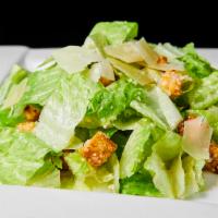 Cesare · Caesar salad, shaved Parmesan, and homemade croutons.
