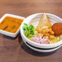 Samosas Soup · Tangy samosa soup with ginger, garlic, dry chili, mint, jalapenos, cabbage, onions, falafel ...