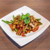 Fiery Tofu · Wok stir-fried with tofu, red bell peppers, string beans, garlic, chili, ginger and soy sauce.