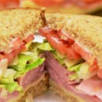Turkey & ham sub · ham and turkey with cheese choice of your condiment and lettuce, tomato and onion