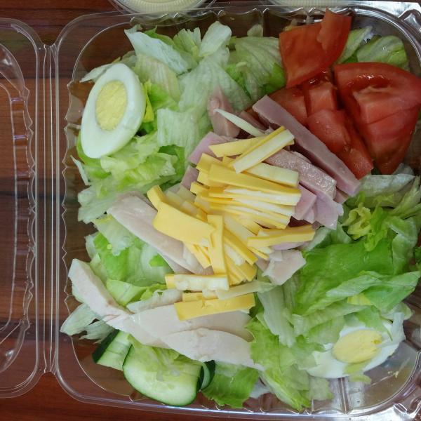 Lg. Julienne Salad · 2 dressings. Lettuce, tomato, cucumber, ham, turkey, cheese and hard boiled egg.