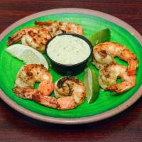 Grilled Shrimp Limon · Jumbo shrimp grilled with our special seasoning and served with la Mexican signature sauce.