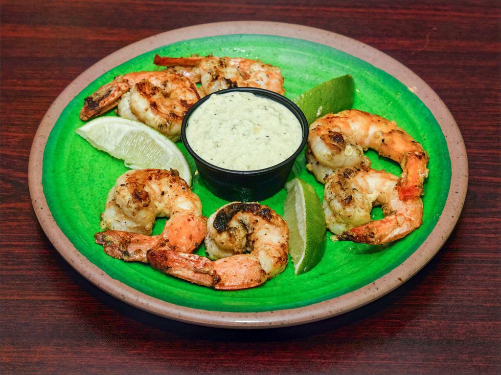 Grilled Shrimp Limon · Jumbo shrimp grilled with our special seasoning and served with la Mexican signature sauce.