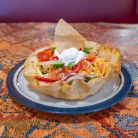 Fajita Taco Salad with Chicken · Crispy flour tortilla shell with lettuce, grilled onions, tomatoes, red and green bell peppe...