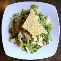 Caesar Salad · Romaine hearts, Parmesan crisp, garlic croutons, crispy shallots, classic dressing.