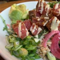 East Side Poke Bowl · Marinated tuna, farro, arugula, avocado, scallions, cilantro, pickled onions, miso sauce and...