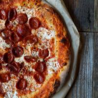 Pepperoni Pizza · Curly pepperoni, tomato sauce, mozzarella, oregano, chili flake.