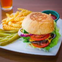 Burger Combo · Premium burger patty served in brioche bun with lettuce, tomatoes, onions, green pickles, ga...