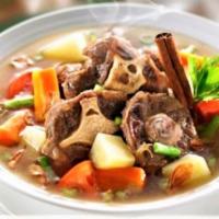 Sop Buntut (Ox Tail Soup) · Ox tail soup with vegetables.
