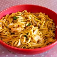 Lo Mein · Shrimp and chicken, stir-fried soft noodles and vegetables in curry sauce. 