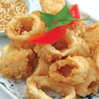 Crispy Calamari · Crispy, mouthwatering fried calamari, and served with sesame plum sauce.
