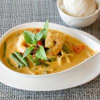 Red Curry · Choice of meat or seafood, bamboo shoots, basil leaves and bell peppers simmered in red curr...