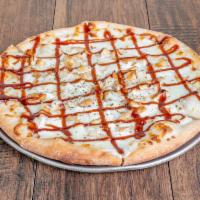 Sweet Alfred Pizza · Alfredo sauce, mozzarella, ricotta, chicken, and a touch of BBQ on top.
