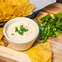 White Queso Dip · Low fat sonoma jalapeno cheese with roasted red bell pepper and chopped fresh spinach.