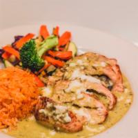 Chicken Poblano · Stuffed chicken breast with poblano pepper strips, mushrooms onions topped with poblano crea...