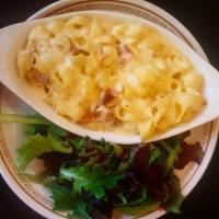 Mac and Cheese · Four-cheese mac n'cheese with shell noodles. Served with a side salad.