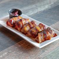 Shakers Poppers · Bacon wrapped, pulled pork jalapeno poppers served with spicy jalapeno jam.