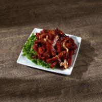 BBQ Sliced Pork · Grilled BBQ pork stir fried with a sweet BBQ sauce.