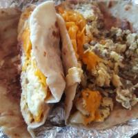 Supreme Taco · Choice of meat with egg, potato, beans, and cheese. 