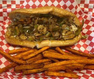 11. Veggie Cheesesteak · Sweet peppers, sauteed onions, mushrooms, bell peppers and cheese.