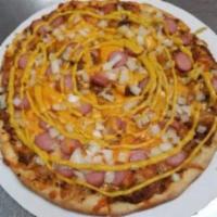 New Coney Dog Pizza · Pizza baked with national island Coney chili, cheddar cheese sauce, Dearborn hot dogs with o...