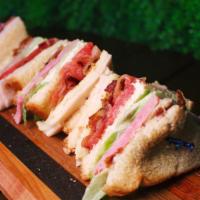 Club Sandwich · Ham • Swiss • Turkey • Bacon • Lettuce • Tomato