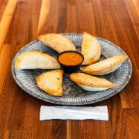 Six Pack Empanadas · Choose up to 3 flavors to build your six pack. 