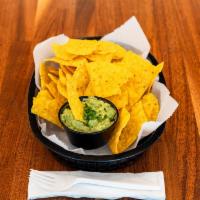 Guacamole and Chips · Homemade with fresh avocados and salsa verde.
