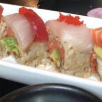 Rock of Love Roll · Spicy tuna, soft shell crab tempura, avocado topped with tuna, king salmon, yellowtail & red...
