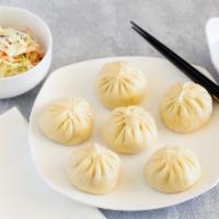Steam Bun (Tianjin Specialty) · Pork Steamed Bun is delicately hand-folded dumplings that wrapped with yeast dough filled wi...