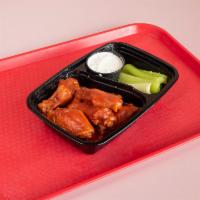 A5. Buffalo Chicken Wings · Your choice of mild, medium or hot. Served with celery and blue cheese dressing on side.
