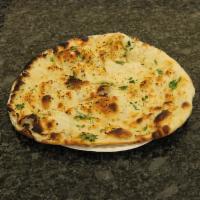 Garlic Naan · Clay oven baked bread stuffed with fresh garlic and green coriander.