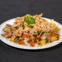 Shredded Chicken Fries · Shredded chicken, salsa fresca, shredded cheese and chipotle lime crema.
