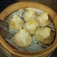 127. Steam Pork and Chive Dumplings · 6 pieces.