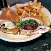 The Old School Sandwich · Grilled chicken on a garlic baguette topped with arugula, bacon, and melted smoked mozzarell...