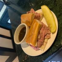 French Dip · Our house-made roast beef served on a wedge with a side of aus jus.